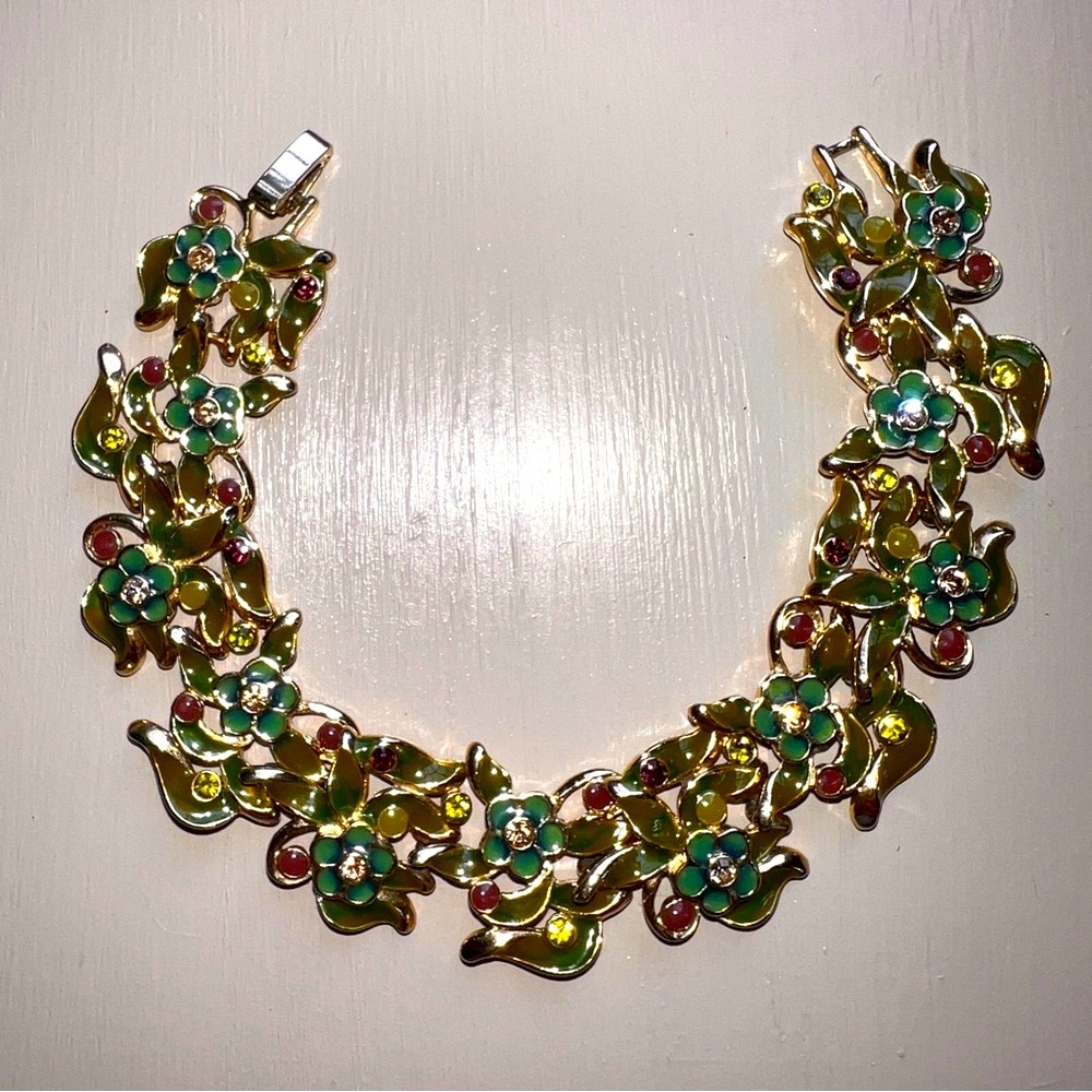 Monet Vintage Enameled & Gold plate 8" stamped bracelet w/ clasp.Mint condition